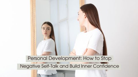 A young woman stands in front of a mirror, thoughtfully observing her reflection, symbolizing self-awareness, overcoming negative self-talk, and building inner confidence, with the text “Personal Development: How to Stop Negative Self-Talk and Build Inner Confidence” displayed across the image.