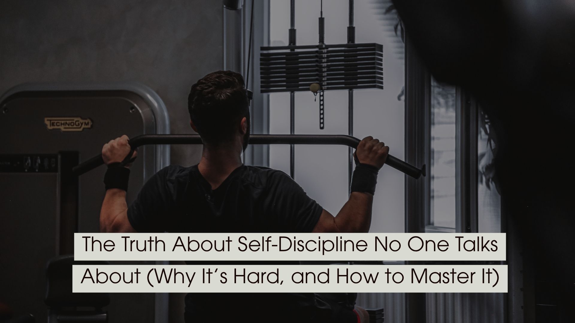 Man working out on a lat pulldown machine in a gym, symbolizing discipline and consistency, with the text “The Truth About Self-Discipline No One Talks About (Why It’s Hard, and How to Master It)” displayed across the image.