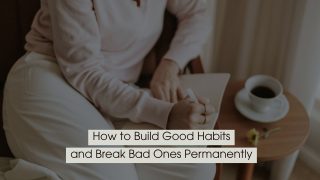 Person sitting comfortably and writing in a notebook beside a cup of coffee, representing reflection and habit-building, with the text “How to Build Good Habits and Break Bad Ones Permanently” displayed across the image.
