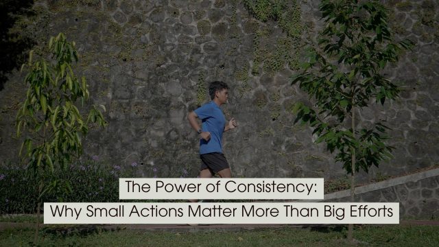 Person jogging outdoors along a path beside a stone wall and greenery, representing steady progress and daily consistency, with the text “The Power of Consistency: Why Small Actions Matter More Than Big Efforts” displayed across the image.
