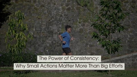 Person jogging outdoors along a path beside a stone wall and greenery, representing steady progress and daily consistency, with the text “The Power of Consistency: Why Small Actions Matter More Than Big Efforts” displayed across the image.