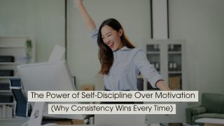 Woman in an office raising her arm in excitement while smiling at her computer, symbolizing achievement and consistency in work, with the text “The Power of Self-Discipline Over Motivation (Why Consistency Wins Every Time)” displayed across the image.
