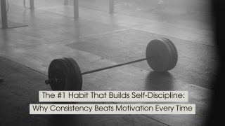 A black-and-white photo of a loaded barbell resting on the floor of an empty gym symbolizes discipline, consistency, and the quiet commitment required to achieve long-term goals. The minimalist, moody atmosphere emphasizes showing up and putting in the work even when motivation fades. Overlaid text reads: “The #1 Habit That Builds Self-Discipline: Why Consistency Beats Motivation Every Time.”