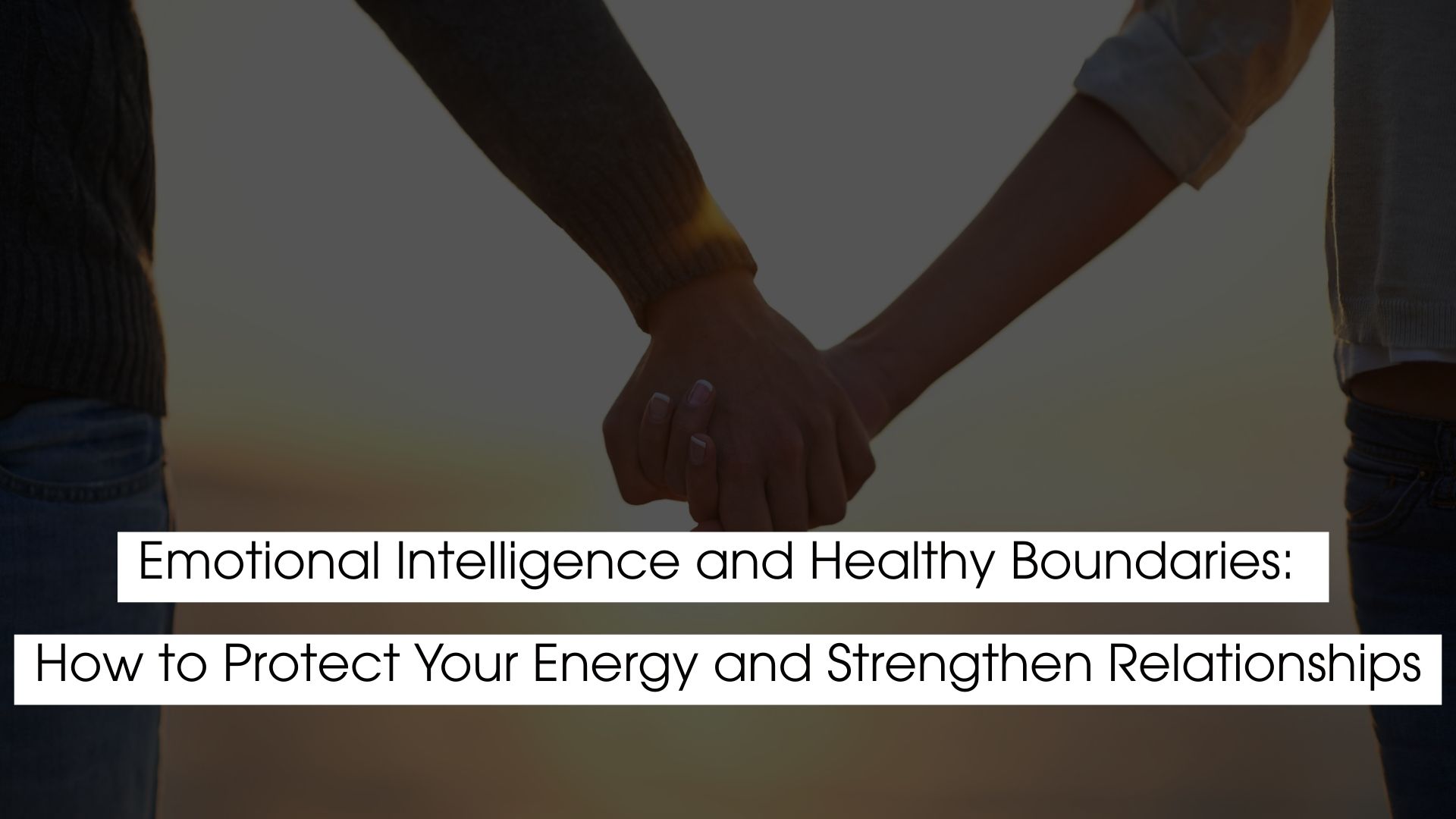 Emotional intelligence and healthy boundaries represented by two people holding hands, symbolizing trust, connection, and emotional balance.