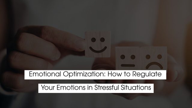 Person holding wooden emotion blocks showing a smiling and sad face, representing emotional optimization and how to regulate emotions during stressful situations.