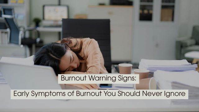 Exhausted office worker resting her head on a desk surrounded by paperwork and coffee cups, with the text “Burnout Warning Signs: Early Symptoms of Burnout You Should Never Ignore” displayed across the image.