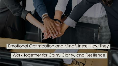 Team members stacking their hands together in a workplace, with the text “Emotional Optimization and Mindfulness: How They Work Together for Calm, Clarity, and Resilience.”