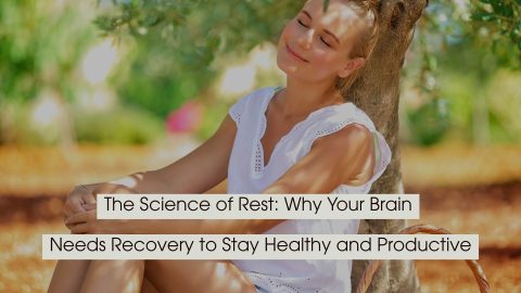 Relaxed woman sitting against a tree outdoors with eyes closed, enjoying a peaceful moment in nature, with the text “The Science of Rest: Why Your Brain Needs Recovery to Stay Healthy and Productive” displayed across the image.